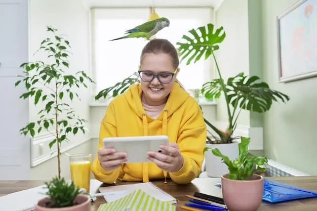 A student smiling while using a tablet in a classroom setting, demonstrating the integration of technology in education. The environment appears modern and conducive to learning.